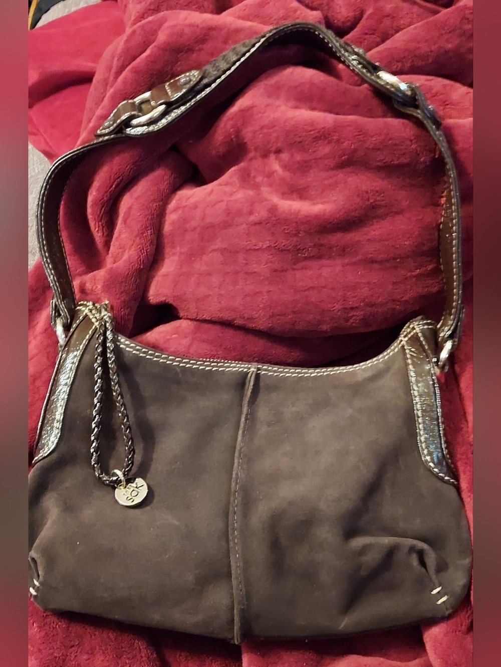 The Sak Brown Cowhide Suede Shoulder Bag with Braided Chain Accent